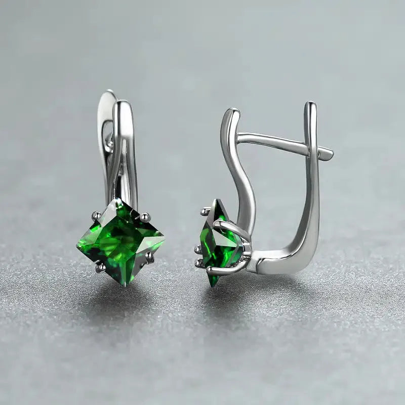 Copper diamond-shaped earrings for women with inlaid zircon stones in blue, green, and colour variants.