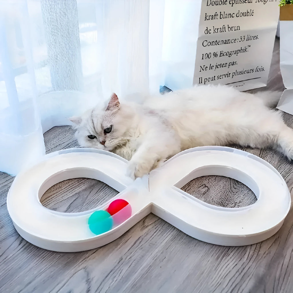 Blue and white cat turntable toy with rotating track ball and teasing stick for feline play