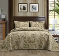 Blue cotton bedspread with floral and bird pattern, part of a 3-piece quilted bedding set.