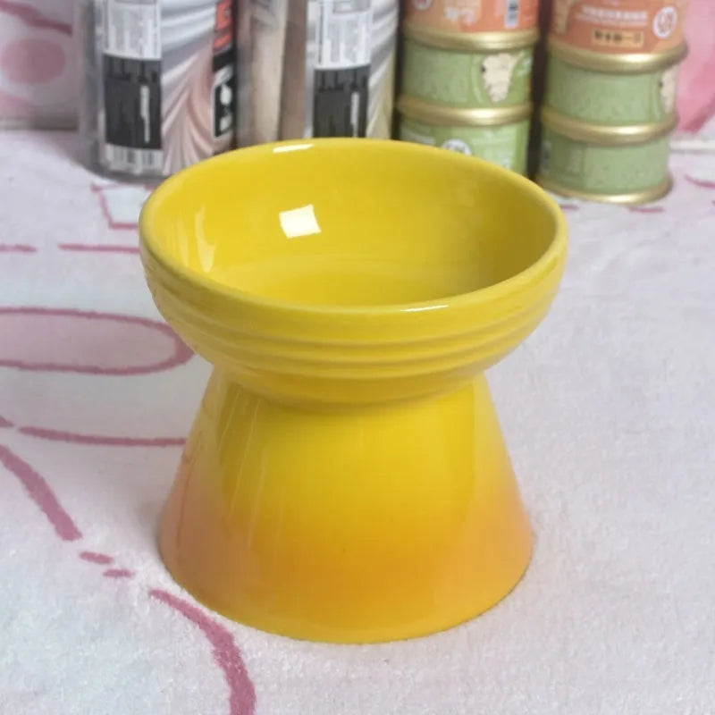 High-foot ceramic pet bowl with chin protector and anti-tumble base design