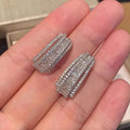 Women's geometric copper stud earrings with inlaid white zircon stones and white gold colour finish