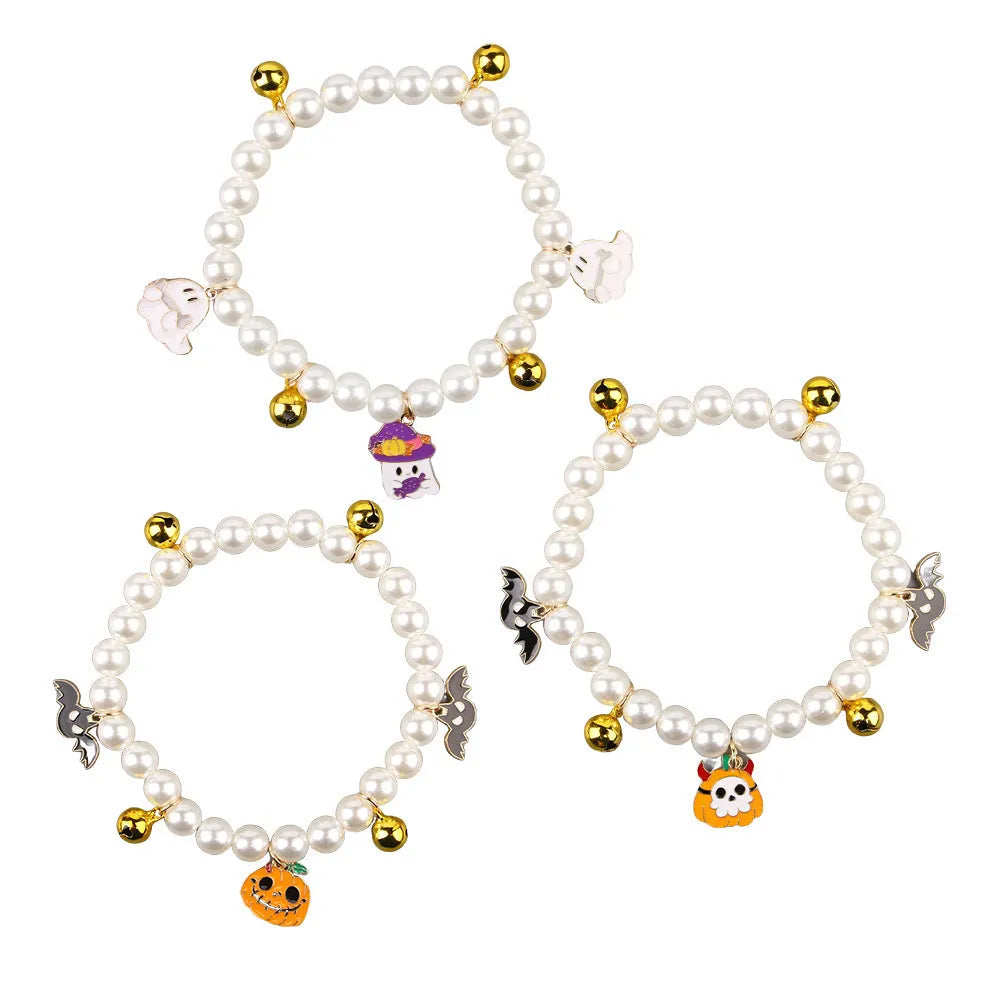 Halloween-themed cat collar with simulated pearl necklace decoration showing pumpkin designs