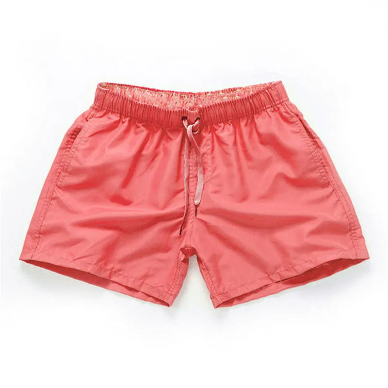 Men's polyester beach shorts in multiple colours with straight leg design for surfing and summer wear, available in sizes S to 4XL