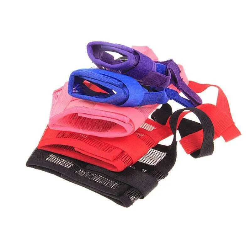 A black adjustable plastic mesh dog muzzle shown on a size chart with options for blue, pink, purple, and red.