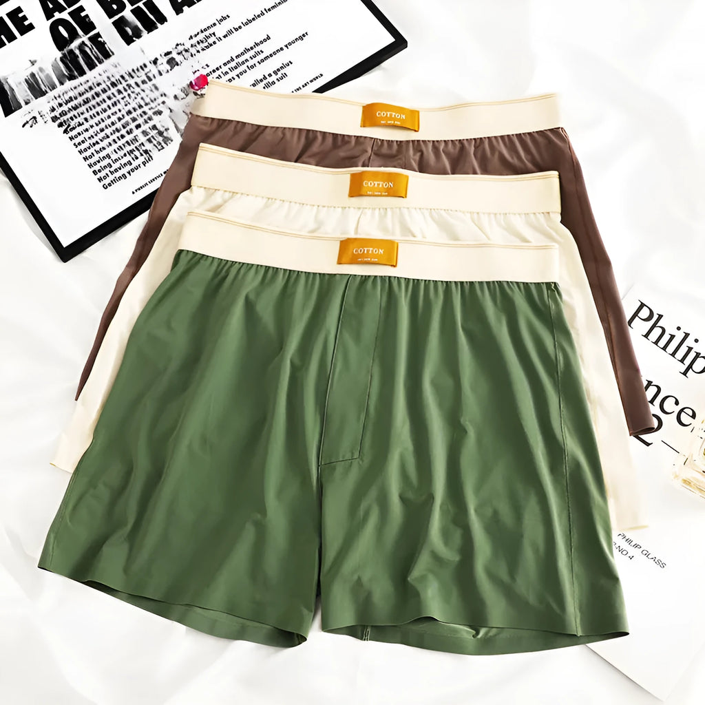 Men's loose fit ice silk underwear in solid colours on mannequin showing mid waist style
