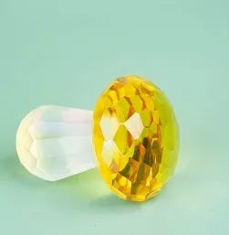 Colourful mushroom crystal decorative craft in transparent, green, red and yellow hues measuring 40x53mm