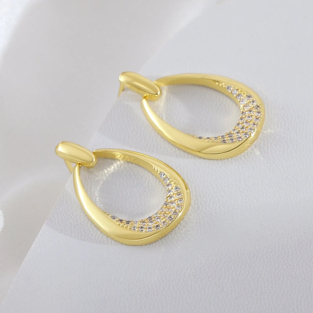 Geometric drop-shaped women's earrings with zircon design and yellow gold electroplated finish