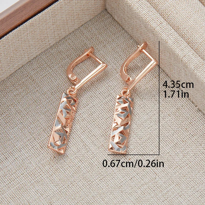 Rectangular two-tone hollow stud earrings with geometric design and silver electroplated finish