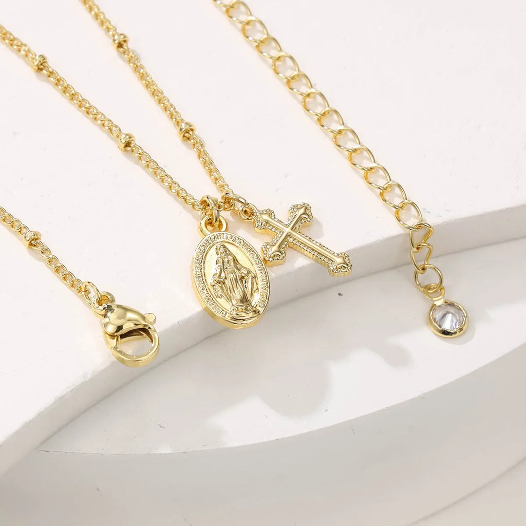 Gold geometric cross Virgin Mary necklace pendant on chain for women's religious jewellery