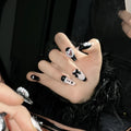 Black and pink heart hand-painted manicure set with bow and XINGX patterns on detachable plastic armour suit