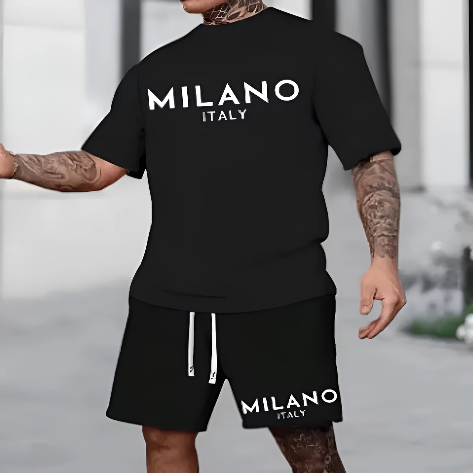 Men's black polyester short sleeve suit set with round neck top and matching shorts