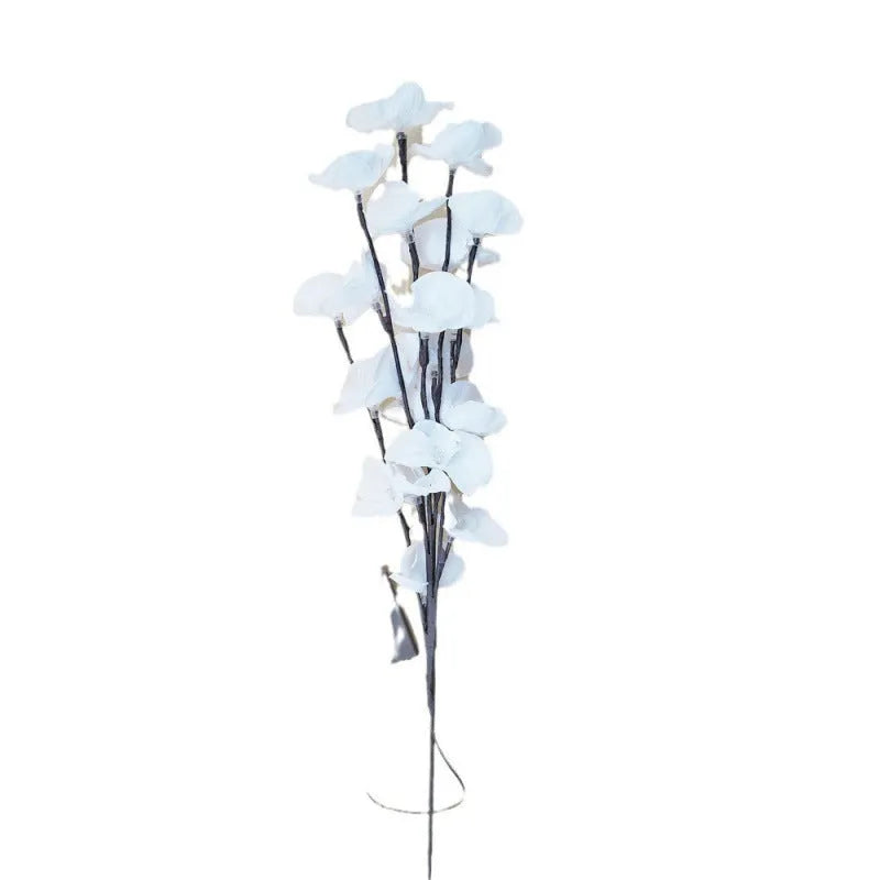 Pink LED phalaenopsis orchid branch decorative light with warm white LEDs on a 65cm stem.