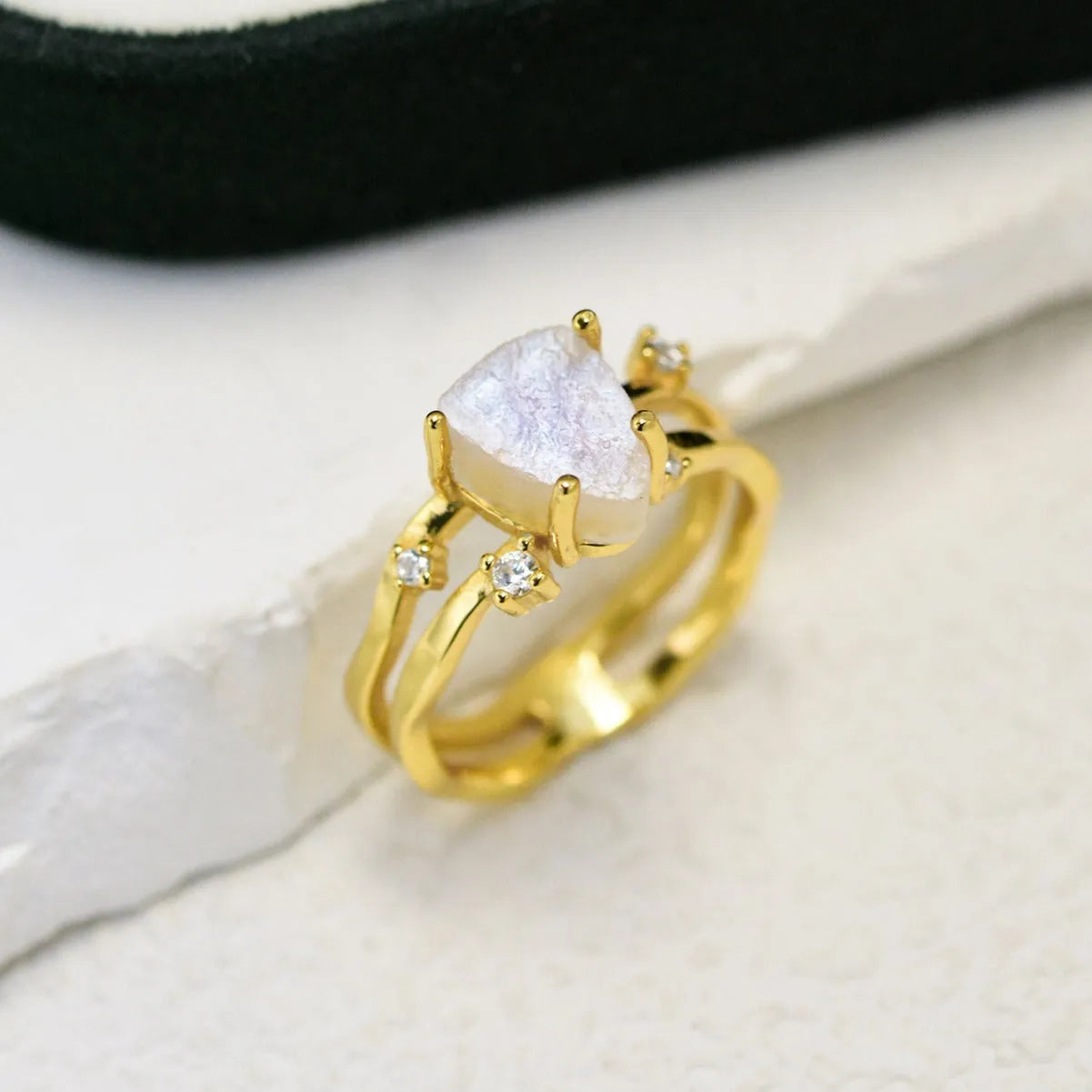 S925 sterling silver irregular triangle ring with moonstone in rose, white, or yellow gold finish.
