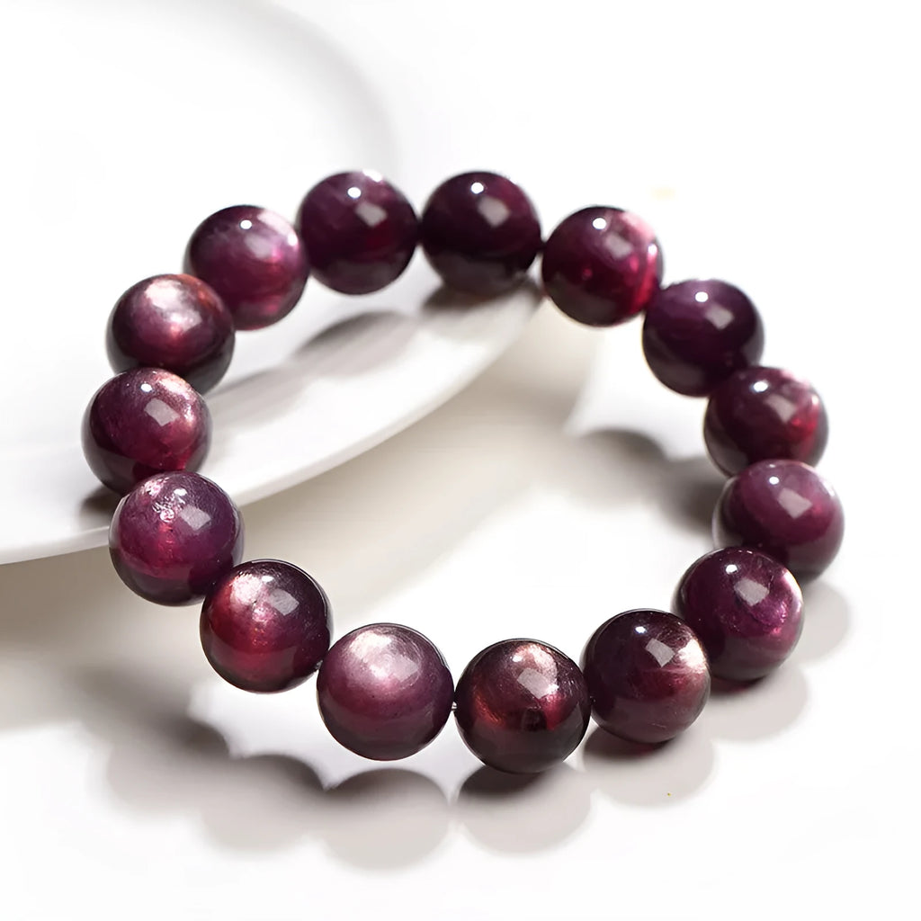 Natural purple lepidolite crystal bracelet with polished round beads in various size options.