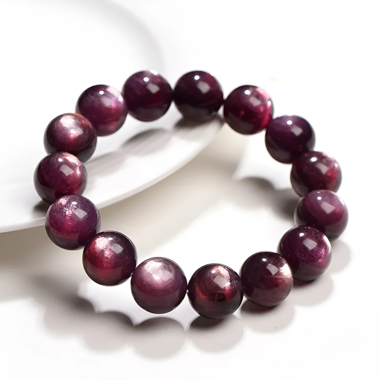 Natural purple lepidolite crystal bracelet with polished round beads in various size options.