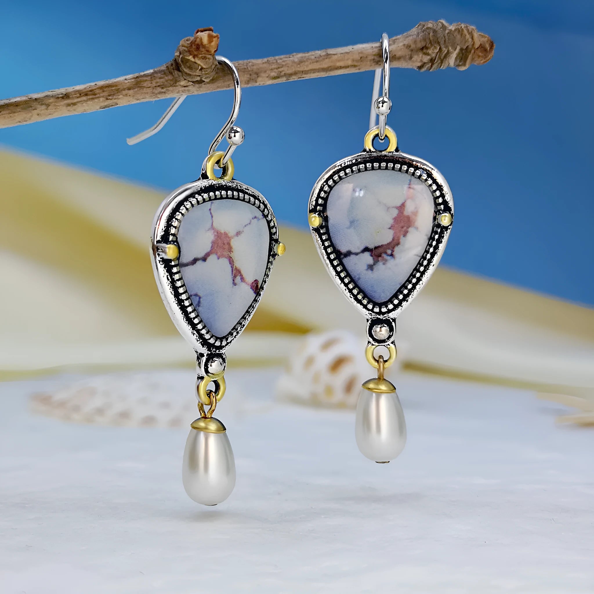 Retro blue geometric drop earrings with synthetic blue opal and white pearl accents