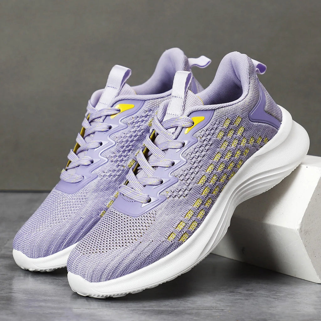 Women's Flyknit running shoes with striped pattern and mesh lining in lavender purple colour