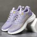 Women's Flyknit running shoes with striped pattern and mesh lining in lavender purple colour
