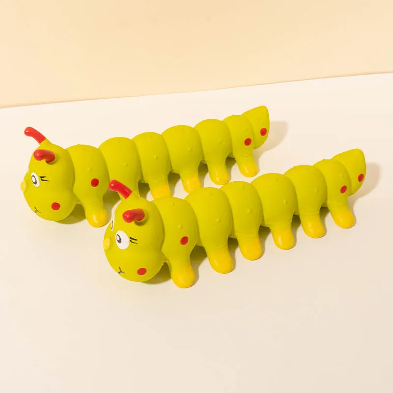 Yellow rubber caterpillar dog chew toy with squeaker for small medium breeds