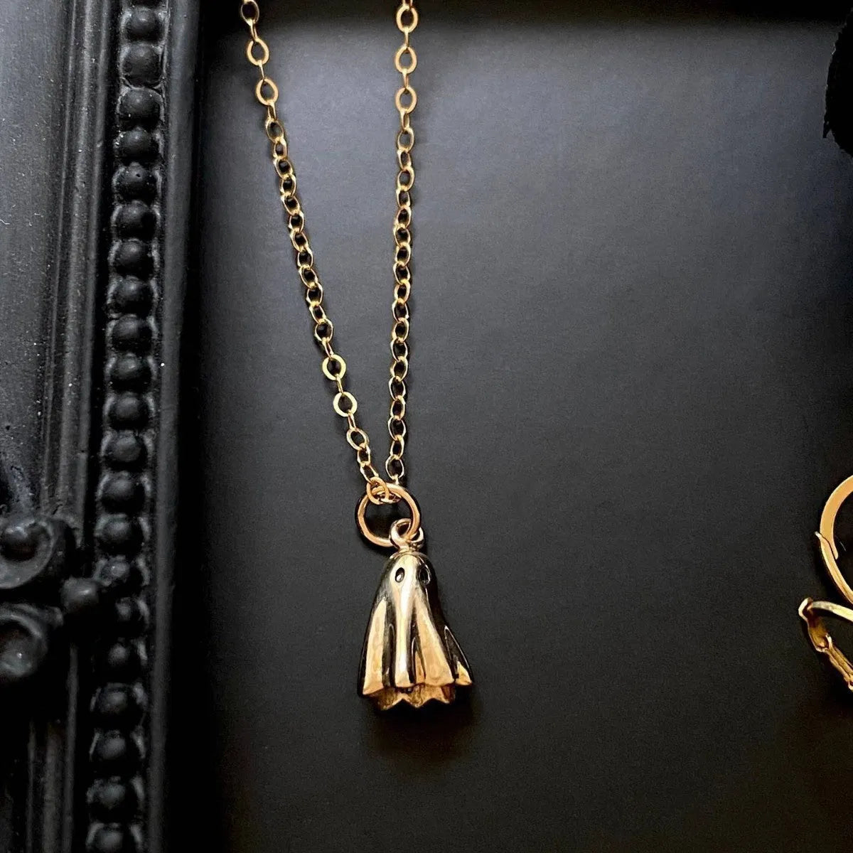 Ghost pendant necklace on a stainless steel chain with titanium steel charm