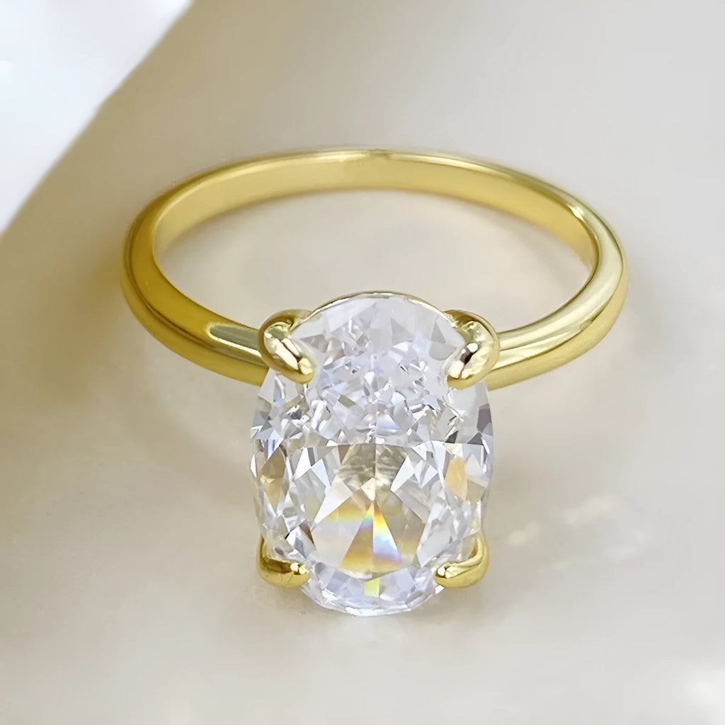 Women's oval ring with four-claw setting in 9 silver, gold and silver colour options