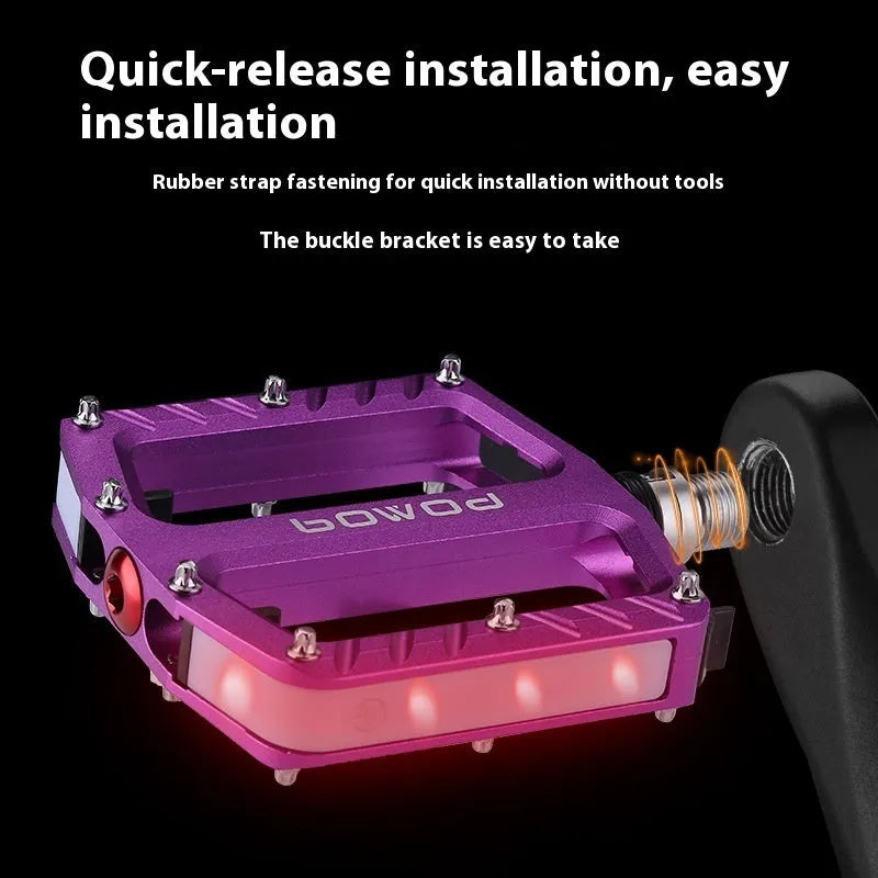 Pair of aluminium alloy bicycle pedals with integrated LED lights in a choice of colours.