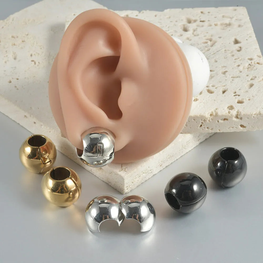 Stainless steel hollow skull Buddha earrings with geometric design and electroplated colour finishes