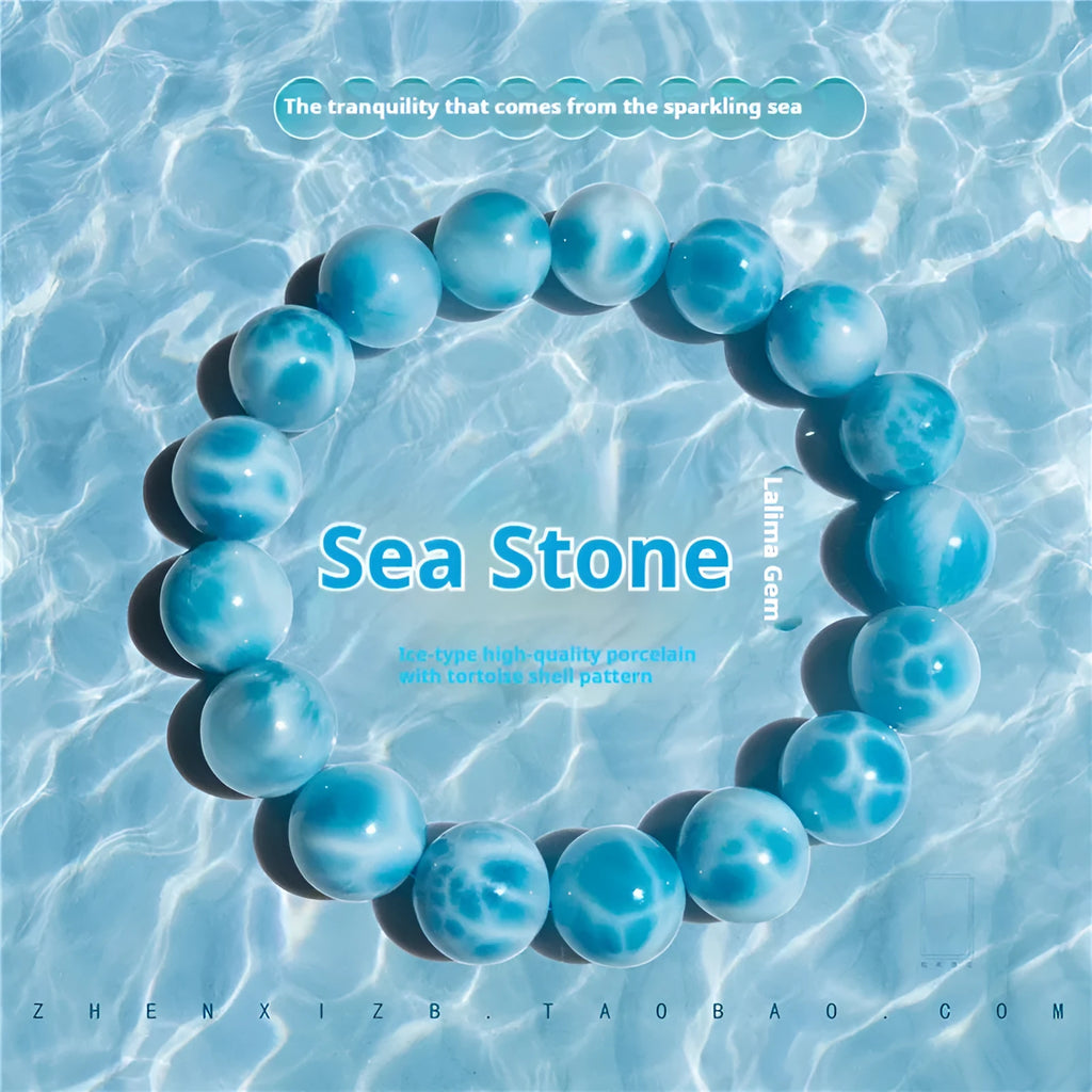 Blue Maillard style bodhi bracelet with natural crystal, sea-pattern stone, and a pearl bead.