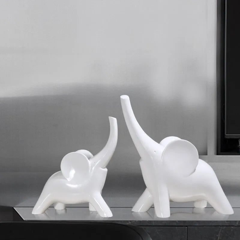 Modern rose gold and white resin elephant ornament figurine for home decor.
