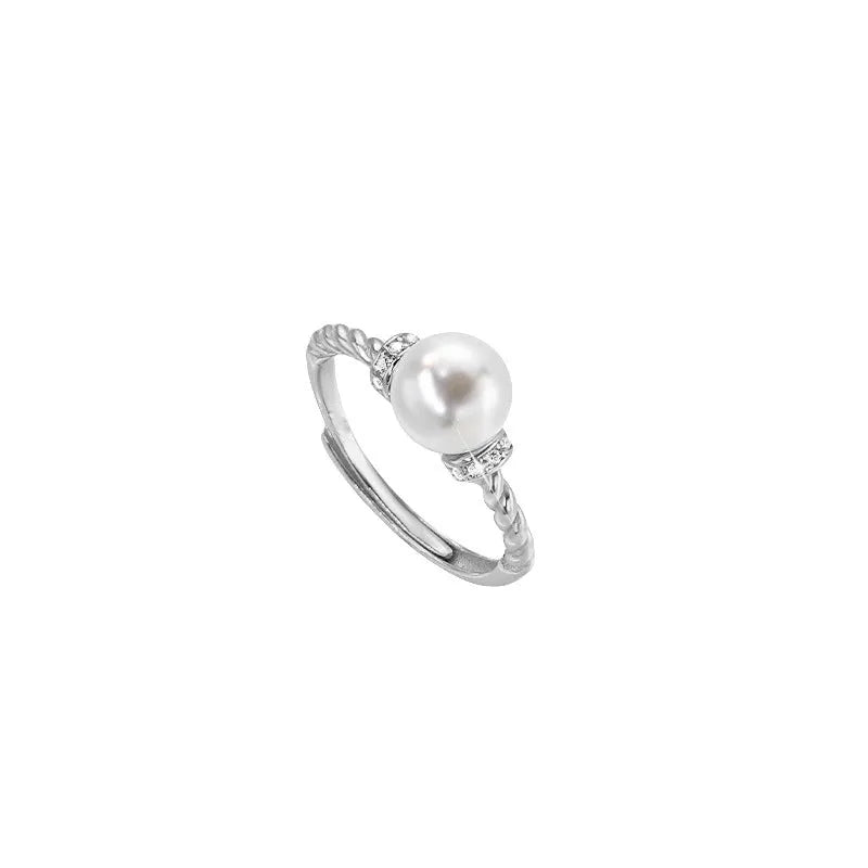 Antique twist pearl ring with adjustable copper band in geometric design with pearl inlay