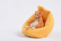 Lazy cat and sofa miniature car ornament set on a dashboard, 7.5cm high.