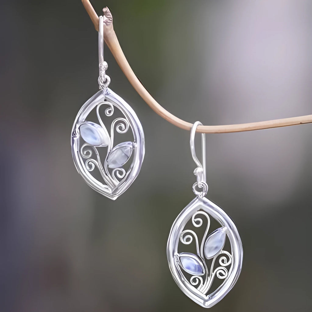 Silver leaf-shaped earrings with embedded colourful moonstones on alloy stud backs