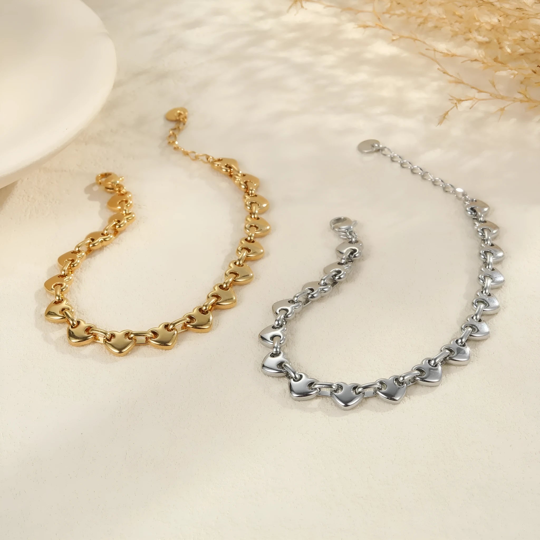 Stainless steel hollow heart bracelet with 18K gold plating in geometric style