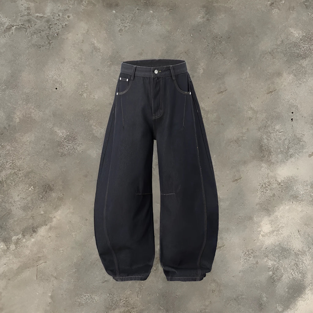 Men's wide leg denim trousers in original cow colour showing mid-waist design and relaxed fit