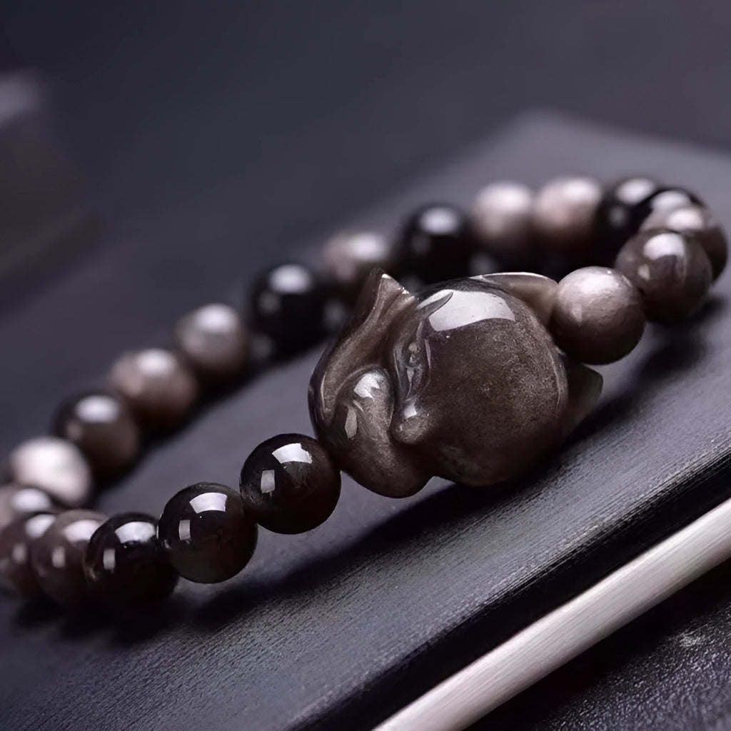 Obsidian fox bracelet with 8mm polished stone beads and detailed fox charm pendant