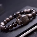 Obsidian fox bracelet with 8mm polished stone beads and detailed fox charm pendant