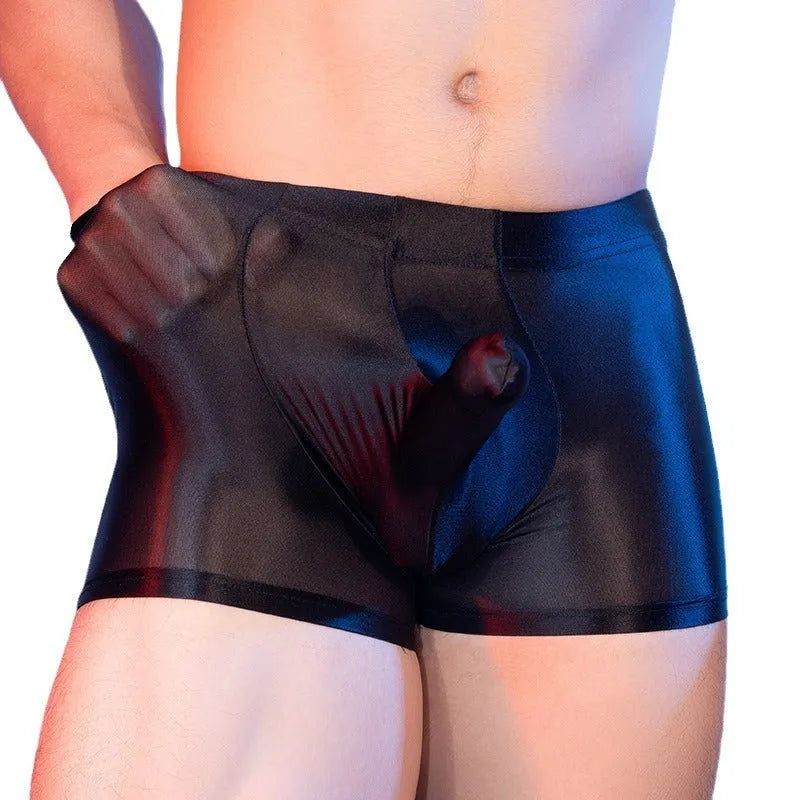 Men's elephant print nylon boxers in red, shown as thin, seamless mid-waist shorts.