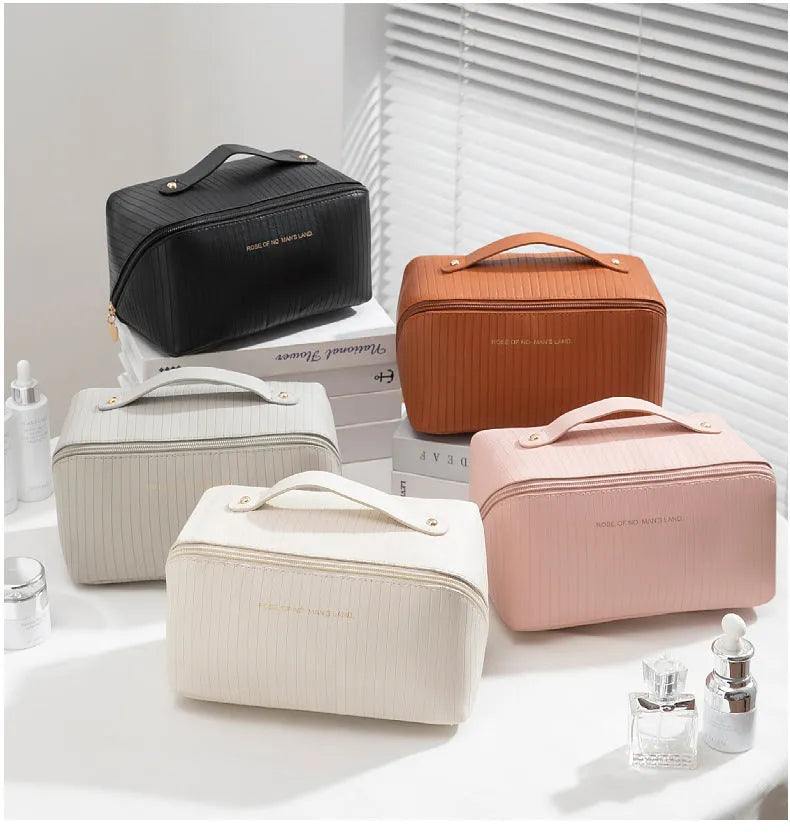 Cubic PU makeup bag with vertical pattern pillow design measuring 22.5cm