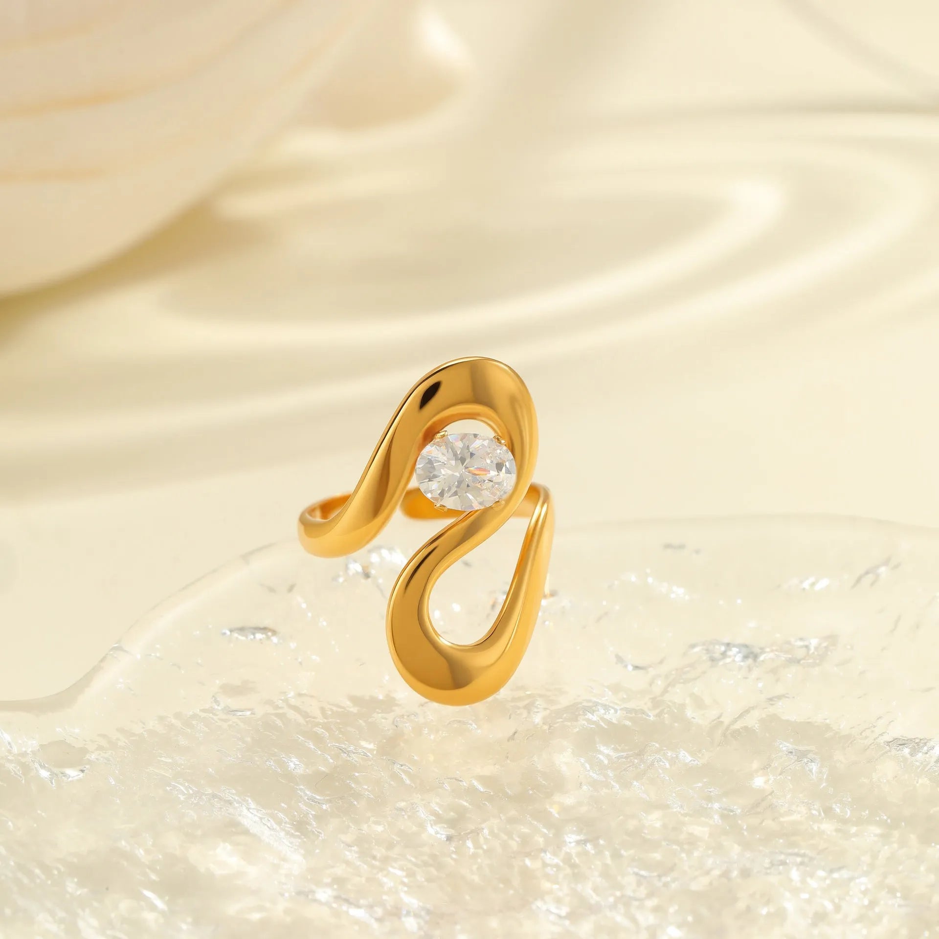 Geometric stainless steel zircon ring with open mouth design in electroplated finish