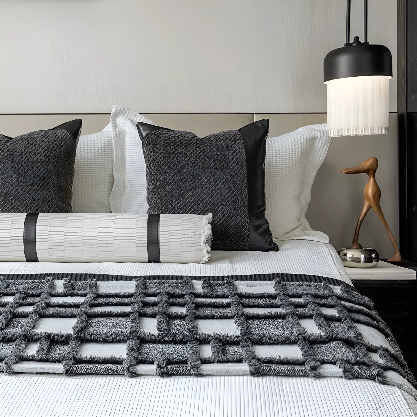Modern minimalist grey and white plaid bed runner set with leather round pillow on a 1.5m-1.8m bed