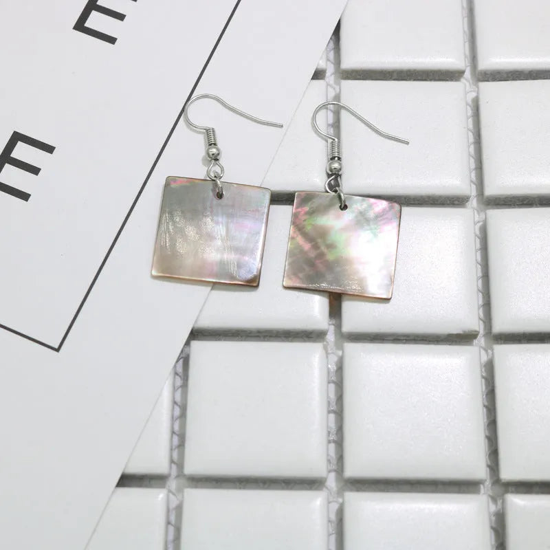 Geometric shell earrings with natural retro styling in square panther or rectangular shell colour options