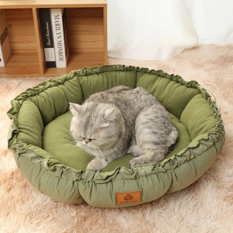 Grey reversible donut cat bed with removable cushion for indoor pets