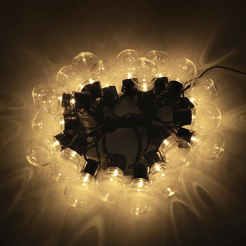 10-metre long solar-powered string of 40 LED decorative lights with plastic bulbs on a black copper wire, for outdoor tent decoration.