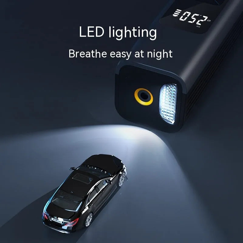 Wireless digital display car air pump and vacuum cleaner with LED light, showing included nozzles and storage bag.