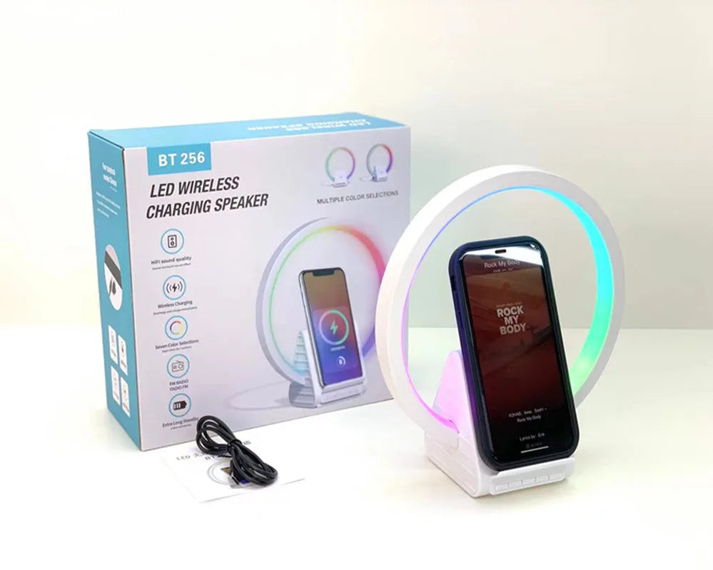 White circular Bluetooth speaker with wireless charging surface measuring 225mm diameter