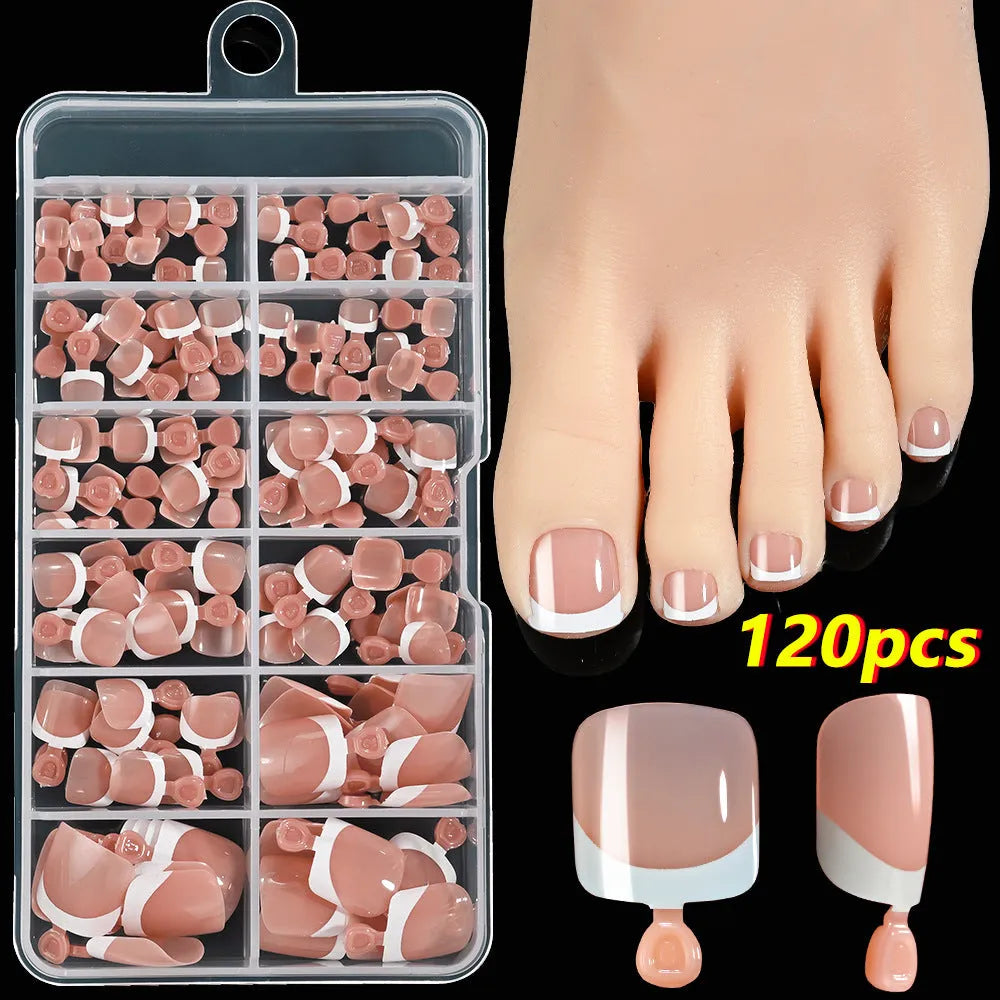 Open box showing 120 French style toe nail pieces with white tips in various nude colours.