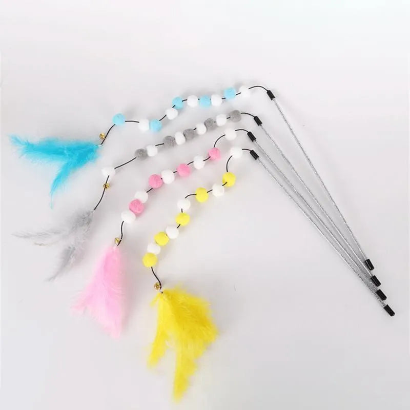 Grey, yellow, and blue cat teaser toy rod with feather, pompon, and bell measuring 31cm.
