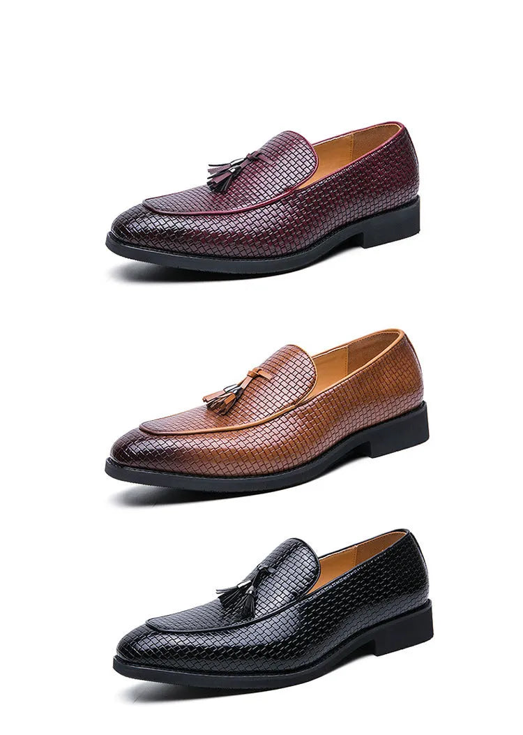 Men's black pointed slip-on shoe with a tassel on a business-style artificial PU upper.