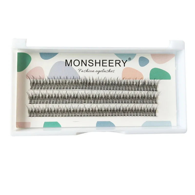 Black V-shaped fairy fishtail false eyelashes showing thick segment design on a clear band.