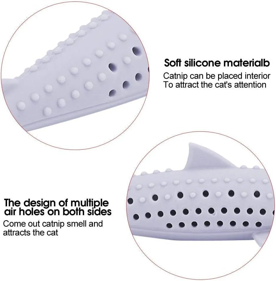 Green silicone fish-shaped cat chew toy with removable parts for catnip, shown on a white background.